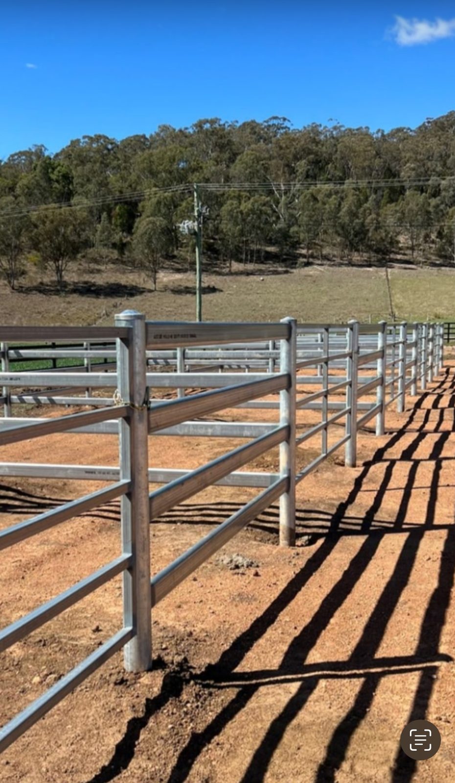 Curved galvanized rail fencing at Widden Stud